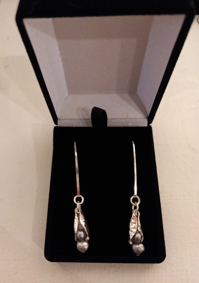 Sarah Anderson
Sterling Silver and Freshwater Pearl
Curled Leaf Earrings
£55