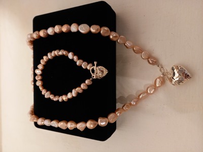 Sarah Anderson
Oyster Freshwater Pearl and Sterling Silver
Necklace £75
Bracelet £45