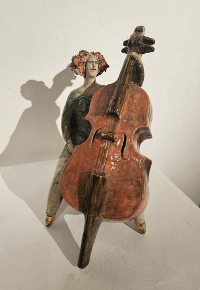 Ludmilla Kosmina
The Cello Player
Handpainted ceramic sculpture h28cm
£350