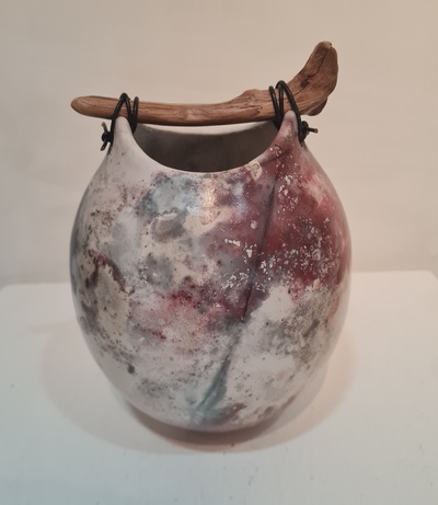 Anne Morrison
Oval Pit Fired Pot
raku ceramic 18cm high
£180